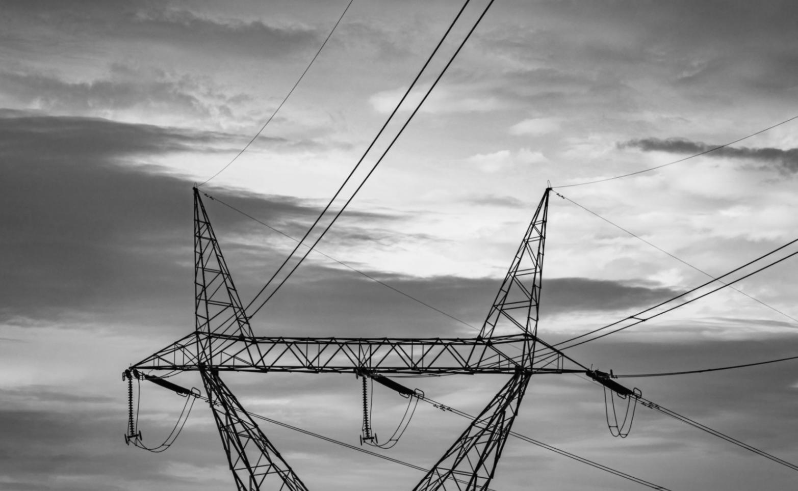 Renewable energy installation with solar panels and wind turbines in operation